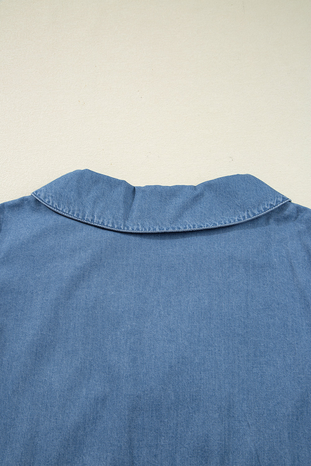 Dusk Blue Denim Lapel Neck Balloon Sleeve Tied Peplum Top